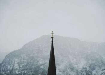 The Two-Stage Founding of Jehovah’s Witnesses: From Russell’s Quest to Rutherford’s Theocracy